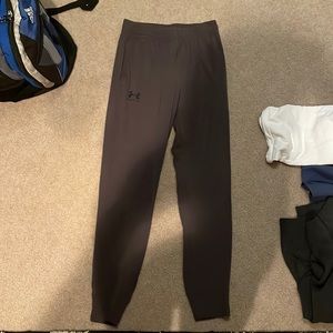Adult M Dark Grey Under Armor joggers.